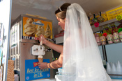 Bride Rachael Whittaker prepares an Ice Cream Cone.